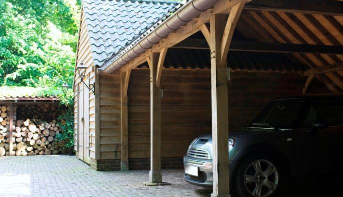 eiken bijgebouw met garage carport met eiken gevel voor mini cooper