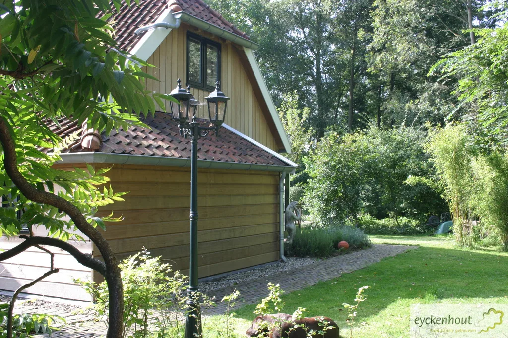 Woninguitbreiding met eiken frame en eiken gevel