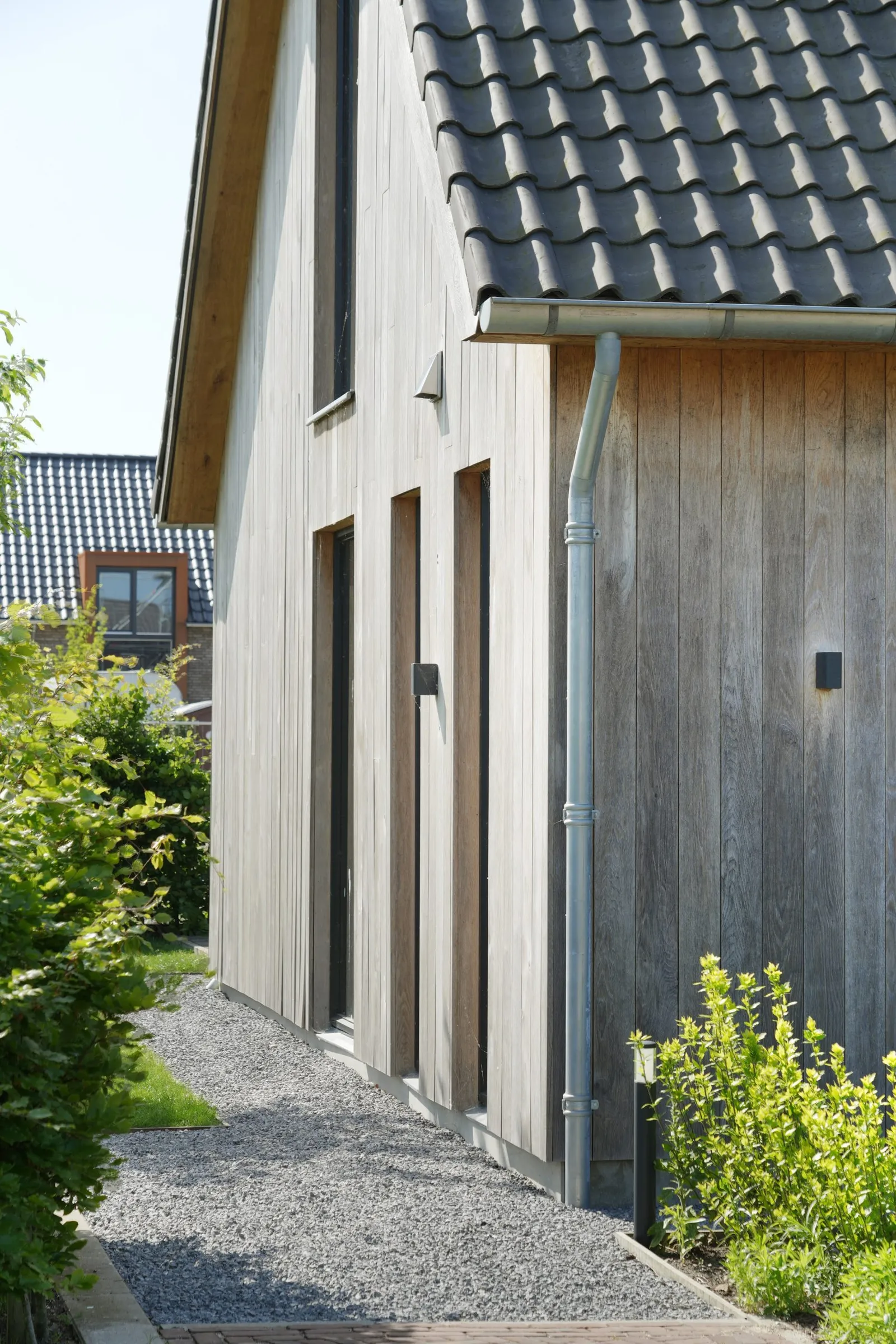 Eiken zijgevel van de woning