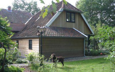 Woninguitbreiding met eiken constructie en houten gevels